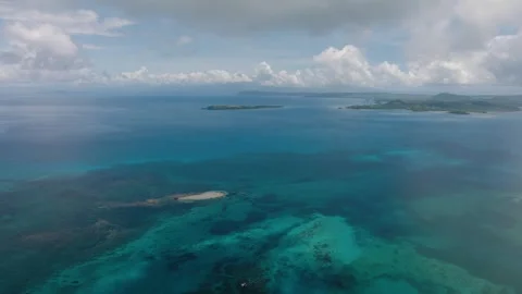 Distant islands with shallow reef lagoon. Siargao, Philippines. Stock Footage 323234432