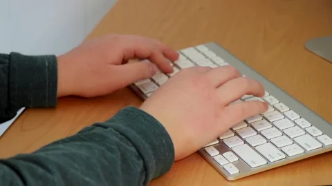 Distant Learner Keyboard 1 Stock Footage 148505577