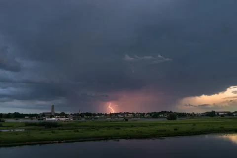 Distant lightning strikes down Stock Photos