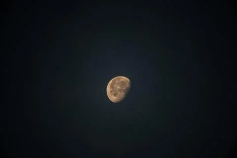 Distant Moon in Black Sky Stock Photos