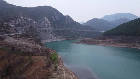 Distant mountains and lakes Stock Footage 247363255