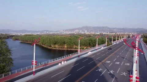 Distant mountains and wide roads Stock Footage 247363346