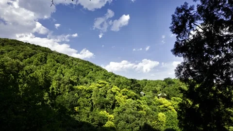 Distant Mountains, Blue Sky and White Clouds Stock Footage 318565174