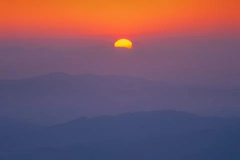 Distant mountains at the sunset Stock Photos
