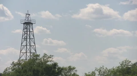 Distant oil derrick Stock Footage 5503769