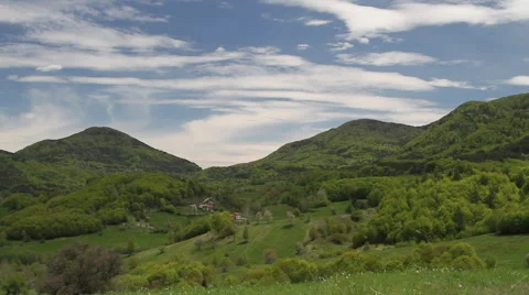 Distant panorama view over the picturesque village of Gudevitsa in the Rhodope Stock Footage 59358809