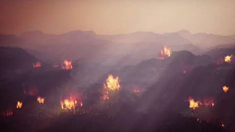 Distant panoramic view of a massive natural disaster of mountain forest fire 库存影片 339634465