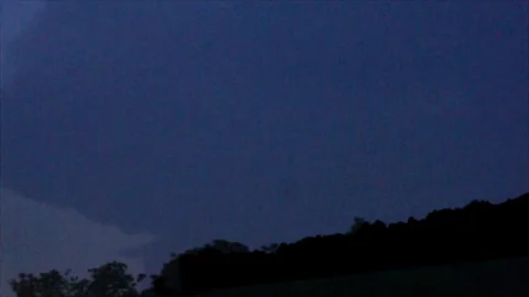 Distant Pink Lightning Forks in Dark Sky Stock Footage 112681940