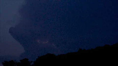 Distant Pink Lightning Forks in Dark Sky Stock Footage 112682016