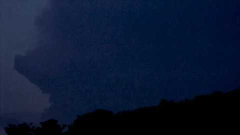 Distant Pink Lightning Forks in Dark Sky Stock Footage 112682046