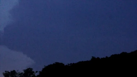 Distant Pink Lightning Forks in Dark Sky Stock Footage 112682186