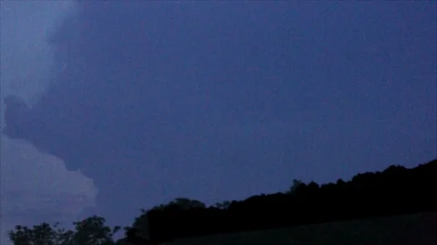 Distant Pink Lightning Forks in Dark Sky Stock Footage 112682216