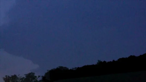 Distant Pink Lightning Forks in Dark Sky Stock Footage 112682426