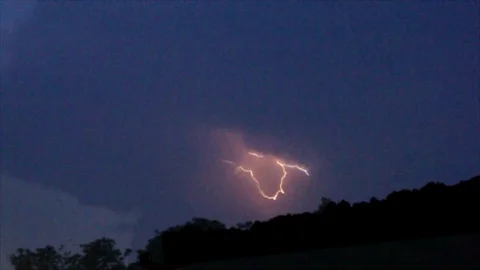 Distant Pink Lightning Forks in Dark Sky Stock Footage 112694740