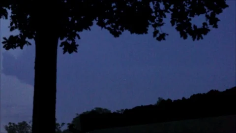 Distant Pink Lightning Forks in Dark Sky Stock Footage 112694874