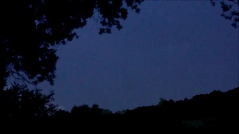 Distant Pink Lightning Forks in Dark Sky Stock Footage 112695610