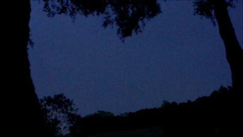 Distant Pink Lightning Forks in Dark Sky Stock Footage 112695723