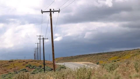 Distant Power Line Along Cloudy California Highway Stock Footage 307446354