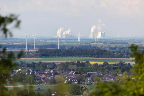Distant Power Stations framed by trees Stock Photos