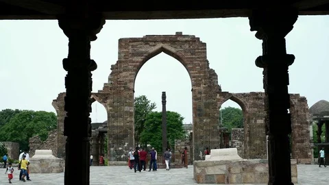 Distant remnants of stone building depicting an entrance. Stock Footage 94891786