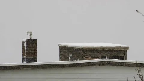 Distant rooftop, with a seagull landing on a dilapidated widow’s walk, Stock Footage 124465648