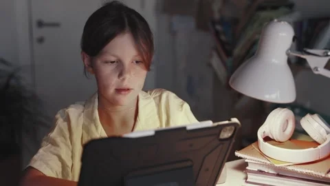 Distant School Learning Concept. Girl Uses Tablet Computer Stock Footage 254685148