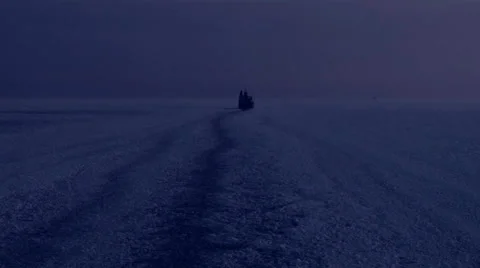 A distant ship sailing through ice on the baltic sea Stock Footage 33845457