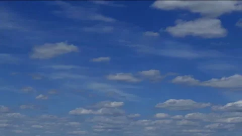Distant shot of blue sky with small white stratus clouds and a few cirrus clouds Vídeos de archivo 153779640