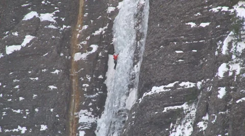 Distant shot of ice climber. Stock Footage 36775221