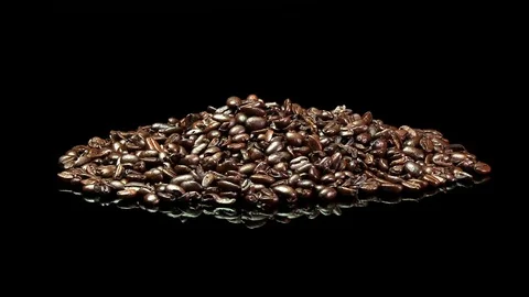 A distant shot of a pile of roasted coffee beans. Stock Footage 73196766