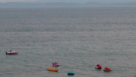 A distant shot of sea waves with a background of blue sky Stock Footage 250962945