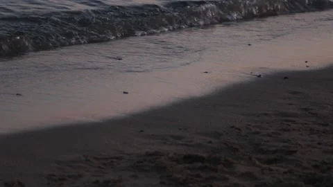 A distant shot of sea waves with a background of blue sky Stock Footage 250964774