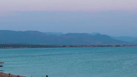 A distant shot of sea waves with a background of blue sky Stock Footage 250967532
