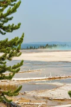 Distant side view of Grand Prismatic Spring on the Fairy Falls trail Stock Photos