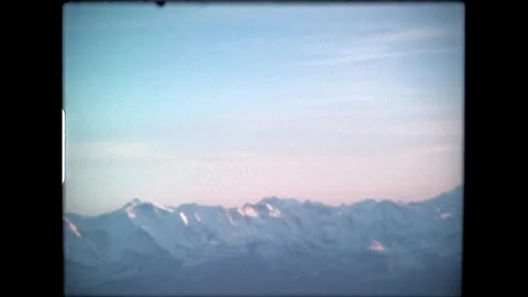 Distant Snowy Peaks Stock Footage 276292373