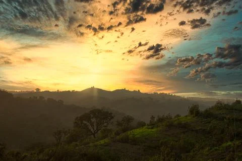 Distant Sunset Haze over Windmill Fields in Litoral Alentejano Fotos de archivo