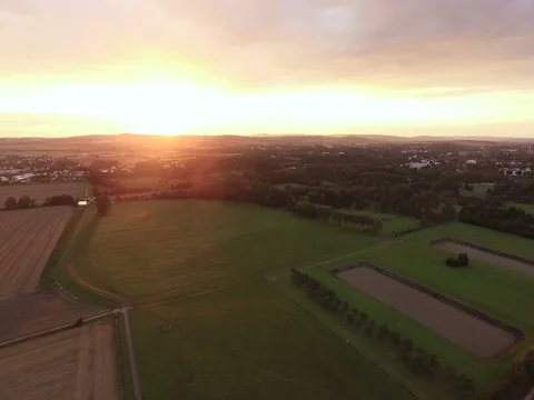 Distant Sunset Over Patchwork Fields and Town 스톡 동영상 84342150