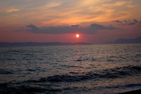Distant sunset over sea Foto stock