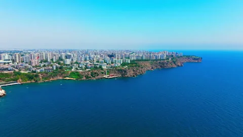 Distant urban strip of mid-rise to high-rise buildings Stock Footage 334212574