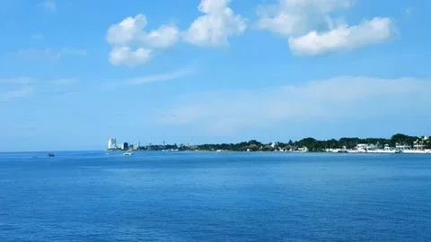 Distant view across the bay of waterfront of San Miguel de Cozumel Stock Footage 157231082