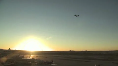 Distant View of Airplane Against a Sunny Blue Sky 2 Video stock 19013230