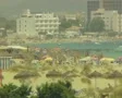 Distant view of busy beach SD Footage