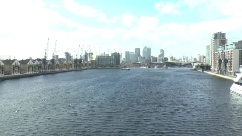 Distant View of Canary Wharf from River Thames in London Stock Footage 73050151