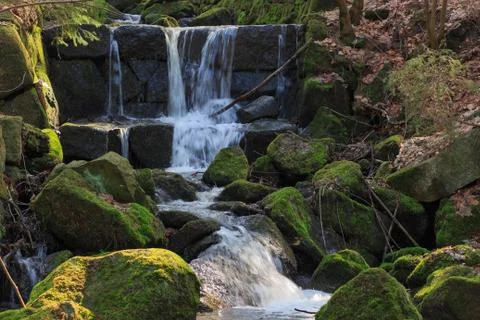 Distant view of the cascade mountain stream Fotos Stock