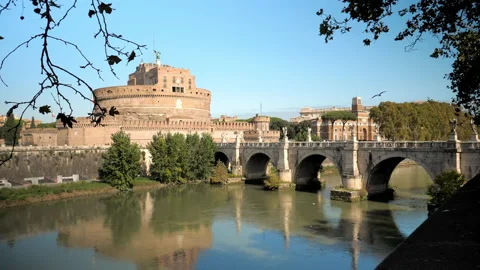The distant view of the Castle Sant'Angelo across the Tiber river on background Stock Footage 148320008