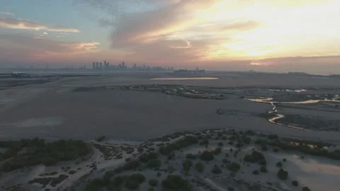 A distant view of the city of Abu Dhabi at sunset. (aerial photography) Stock-Footage 108764637