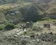 Distant view of countryside workers SD Footage