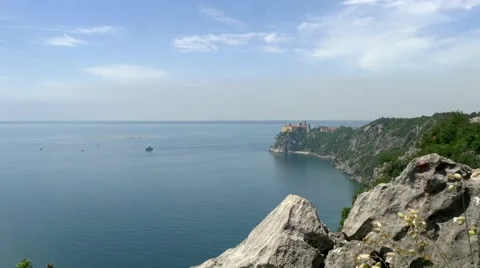 Distant view to Duino castle with rocky coastline Stock Footage 68346070