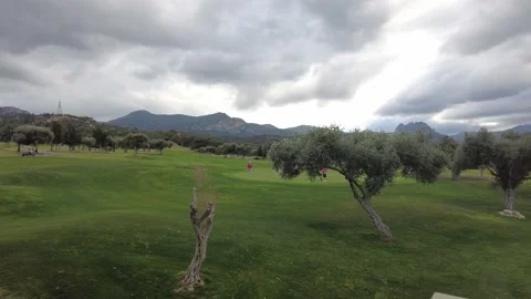 Distant view of golf course on cloudy day. Stock Footage 239481329