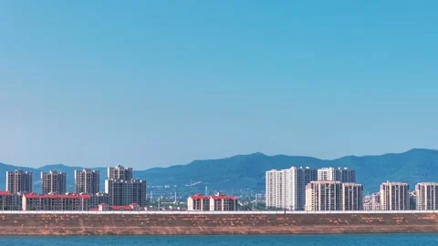 Distant View of Lakeside Settlement Stock Footage 340305205